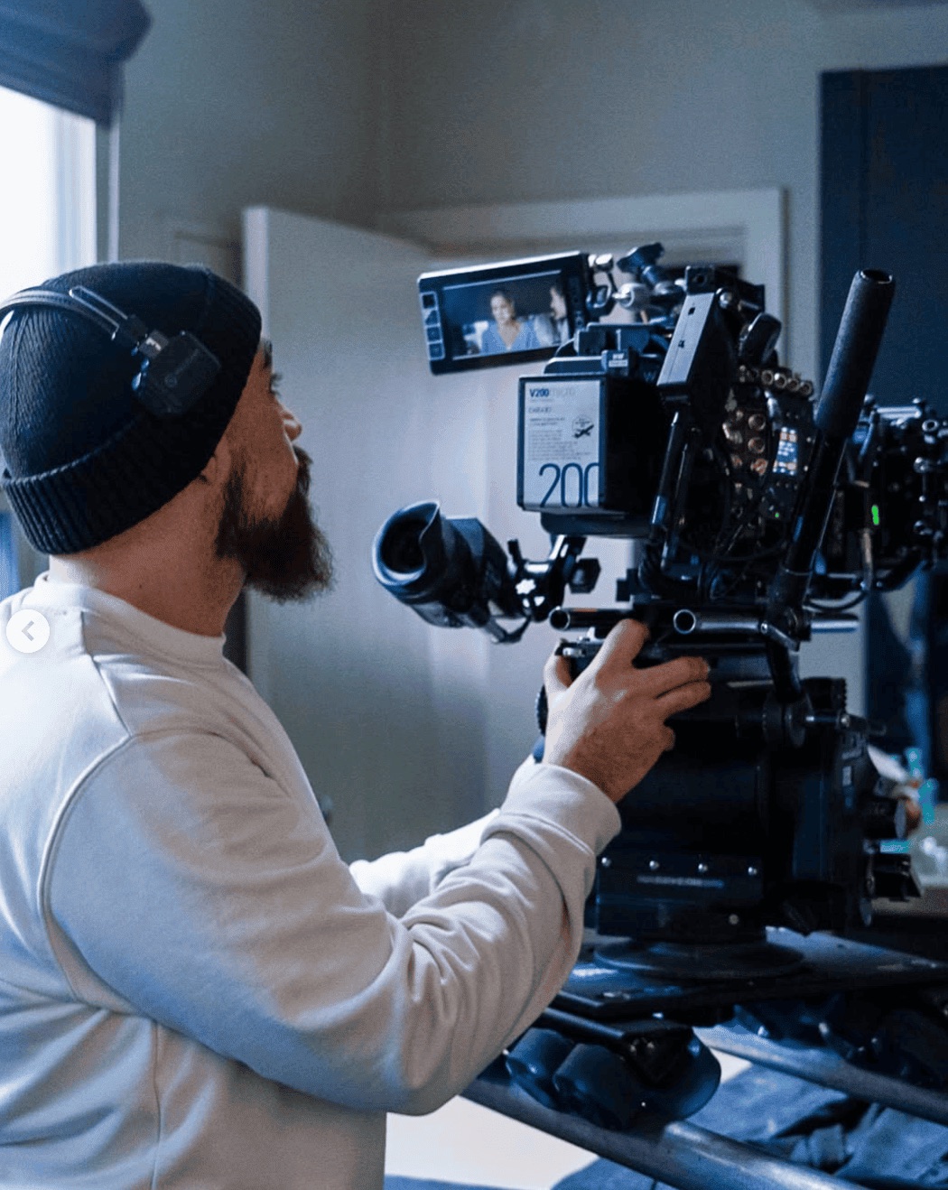 man recording using film camera equipment hired from Shoot Blue