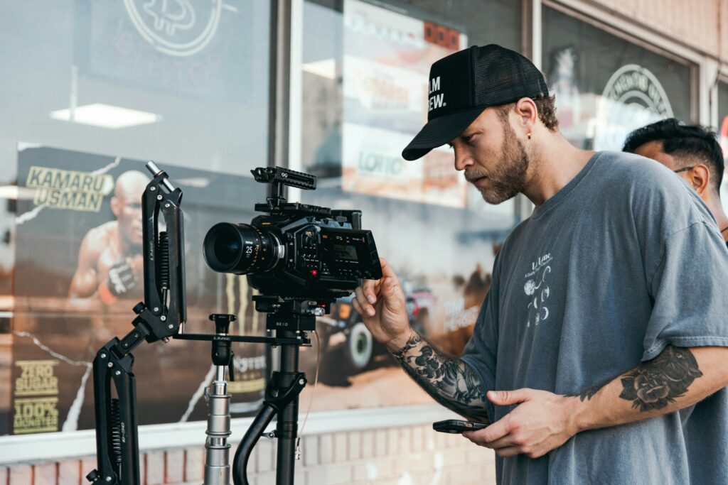 image of a director of photography using a film camera 