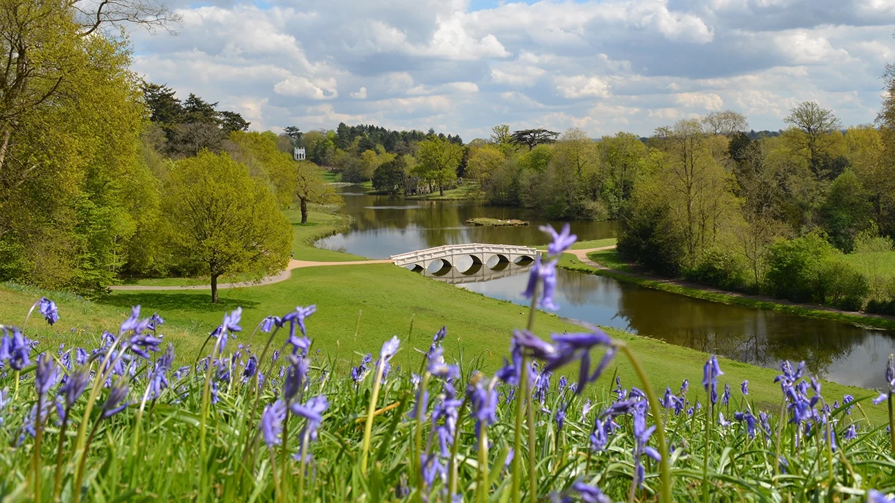 Image of the lake and footbridge at Painshill landscape garden