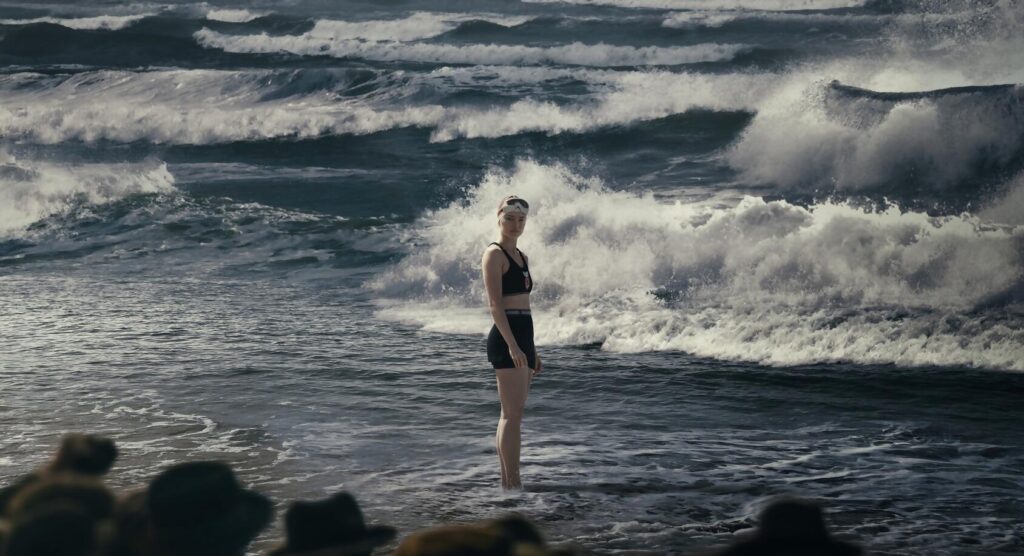 Film still from The Young Woman and the Sea (2024)