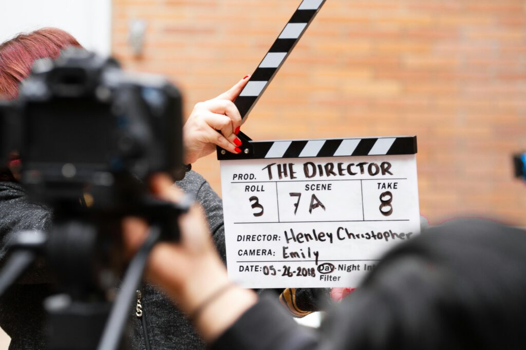 image showing a clapperboard on a film set for the film 'The Director'