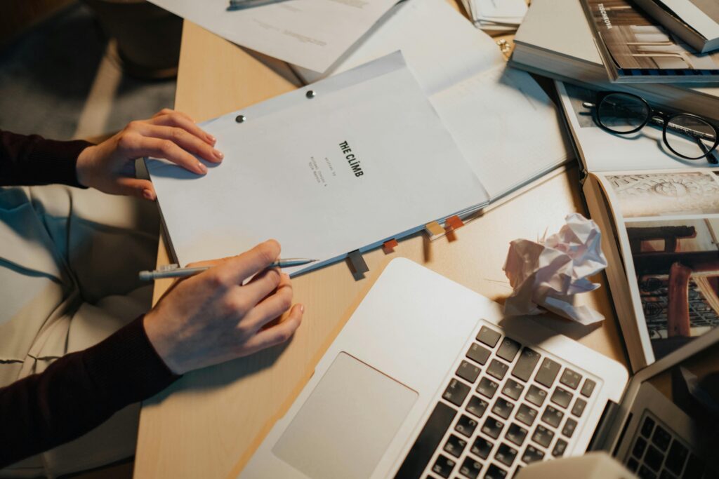 image of a film crew member writing a script 