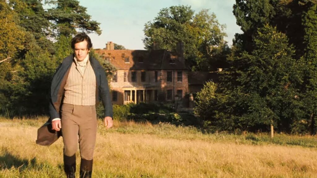 Still frame from Pride and Prejudice (2005) with Darcy walking away from Longbourn (Groombridge Place)