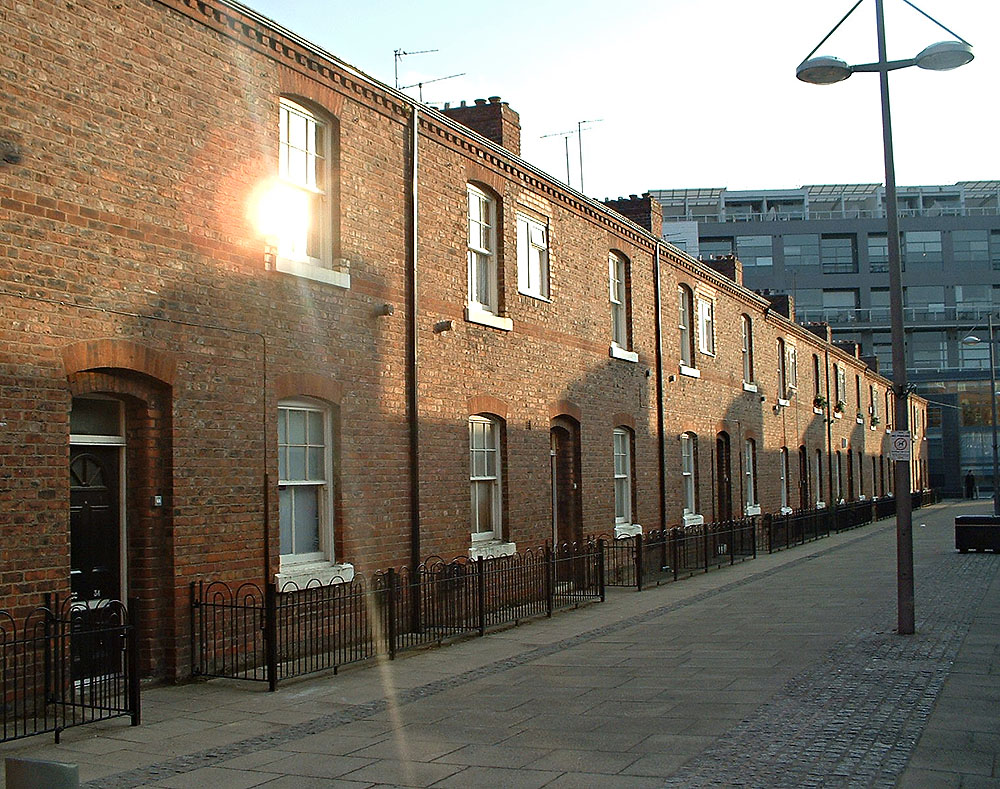 Row of brick terraced houses in Ascots, Manchester