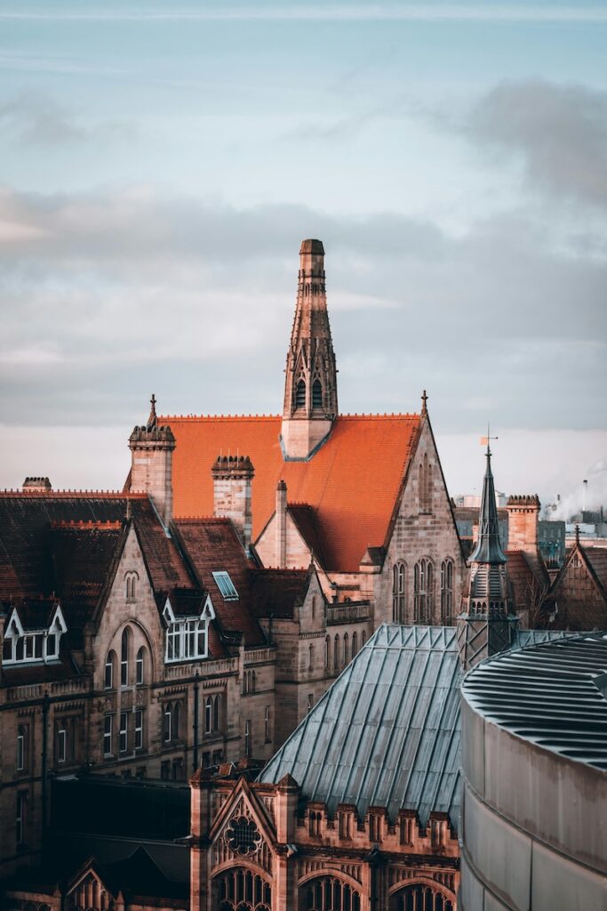 the sky and roofs of Manchester University and Oxford Rood Corridor