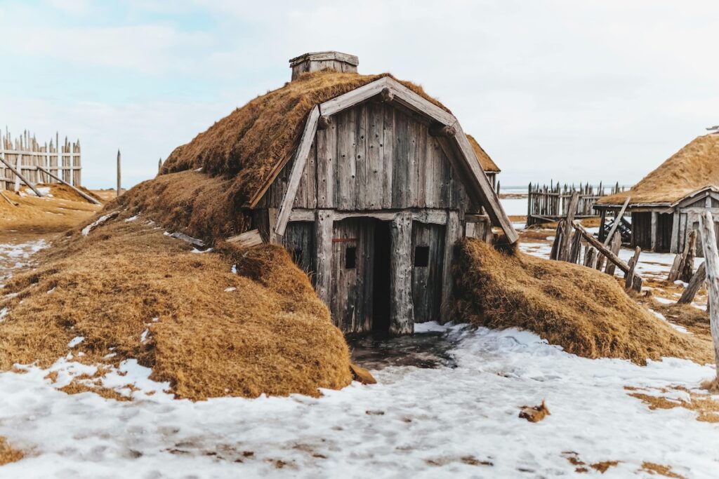 abandoned shack in winter location with snow on the ground