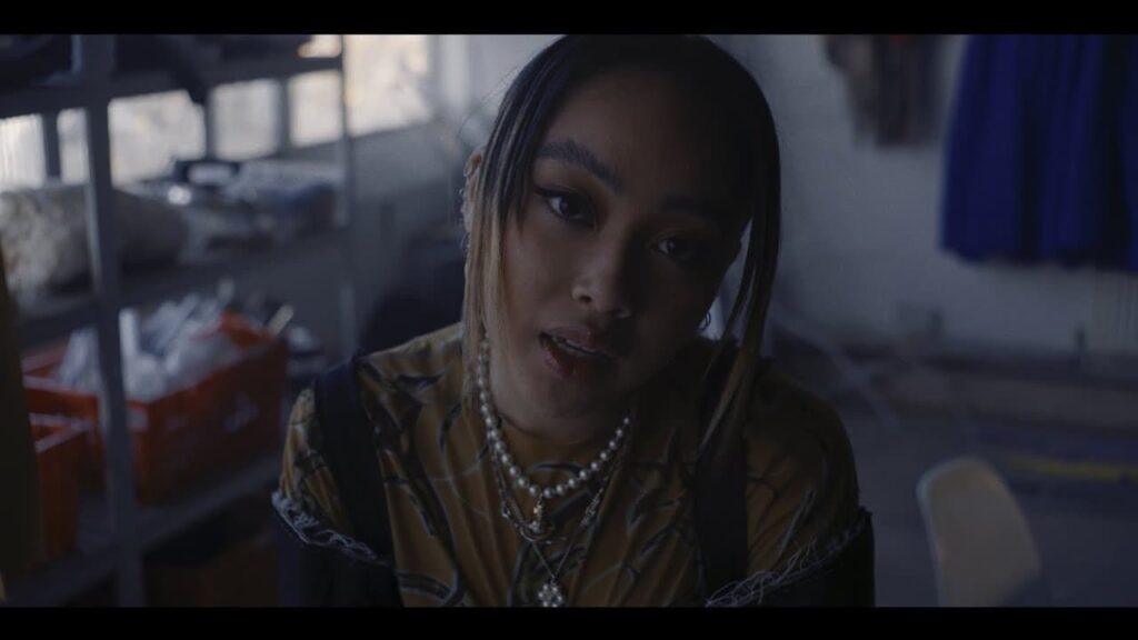 Griff in industrial backdrop for music video of Black Hole