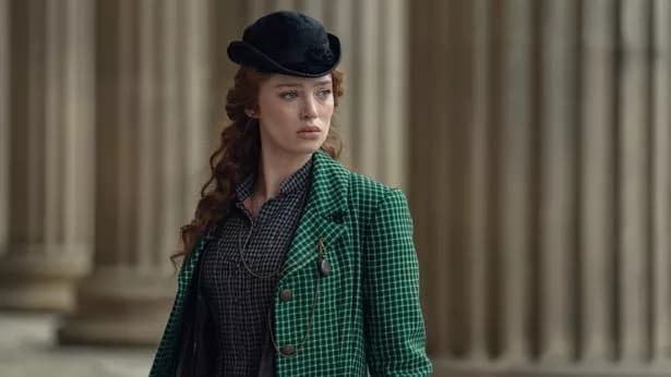 Film still from House of Guiness showing a female chracter outside a large hall