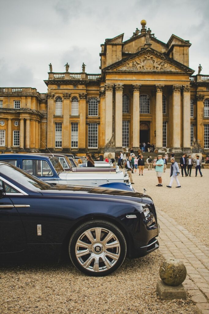 Luxury cars parked in front of Blenheim Palace